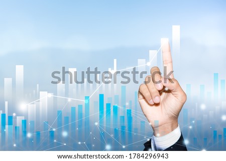 Business data analysis technology, Key performance indicators and growth concept, Hand of businessman pointing on virtual screens