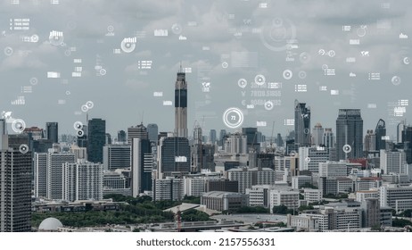 Business data analytic interface fly over smart city showing alteration future of business intelligence. Computer software and artificial intelligence are used to analyze big data for strategic plan .