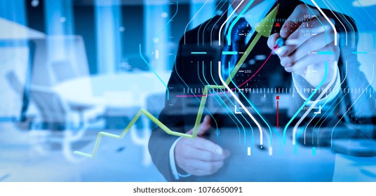 Business data analytics process management diagram.double exposure of businessman hand working with new modern computer and business strategy as concept