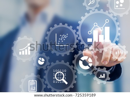 Business data analytics and robotic process automation management with a consultant touching connected gear cogs with KPI financial charts and graph, marketing dashboard