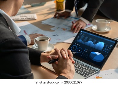 Business data dashboard analysis by ingenious computer software . Investment application display business sales and profit on the computer screen and advise marketing planning decision . - Shutterstock ID 2080021099
