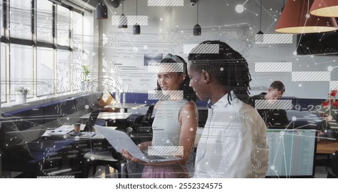 Business data processing image over diverse colleagues discussing work in modern office. teamwork, collaboration, technology, discussion, corporate, innovation