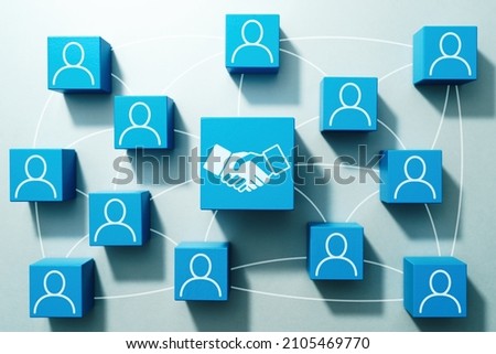 Business deal and collaboration on internet. Top view of many wood cubes with people icons. 
