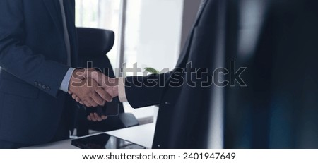 Business deal. Two businessmen shaking hand after signing business contract at office, congratulation, investor, success, business interview, partnership, teamwork, business handshake, successful deal