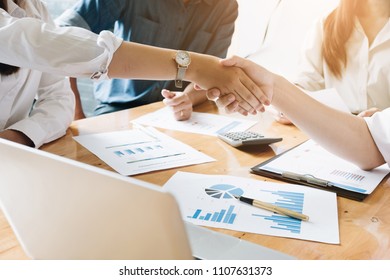 Business Deals Shaking Hands ,Business People Meeting Conference Discussion Corporate Concept in meeting room with computer laptop and calculator, - Shutterstock ID 1107631373
