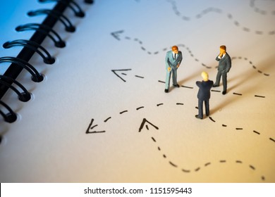 Business decision concept. Businessman thinking with many arrow path.  - Shutterstock ID 1151595443