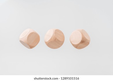 Business & Design Concept - Abstract Geometric Real Floating Wooden Blank Dice Isolated On Background, It's Not 3D Render.