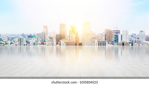 Business and design concept - empty stone panel ground with panoramic city skyline aerial view under bright sun and blue sky of Tokyo, Japan for mockup or montage product