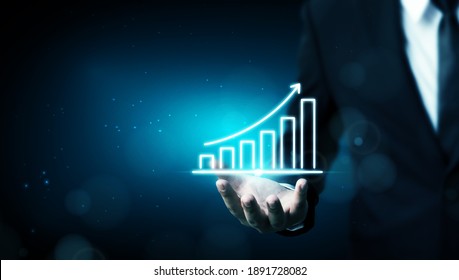 Business development to success and growing growth concept. Businessman holding graph and arrow increase