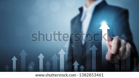 Business development to success and growing growth concept. Businessman pointing arrow graph corporate future growth plan