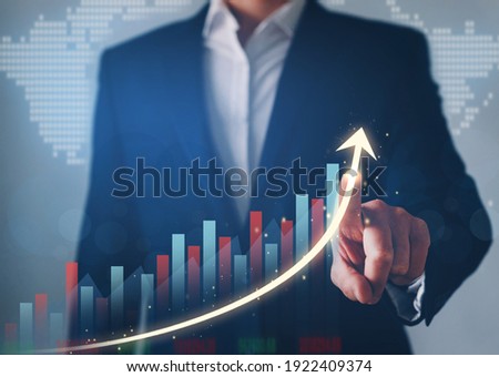 Business development to success, profit and growing  plan. Businessman finger pointing increase arrow graph chart. 