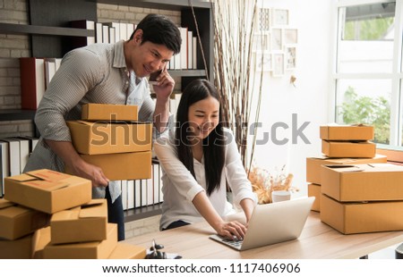 business digital online is small business a new start up in the present for online shop. By woman and man owner have a warehouse used to send to customer. SME entrepreneur concept ストックフォト © 