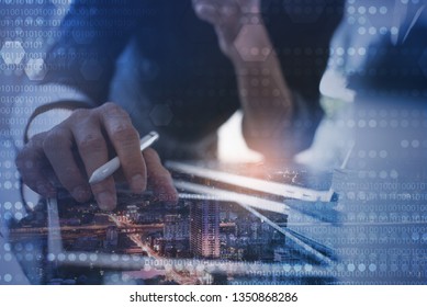 Business and digital technology, software development concept. Man coding programmer, software developer working on digital tablet and laptop computer with binary, big data and technology background