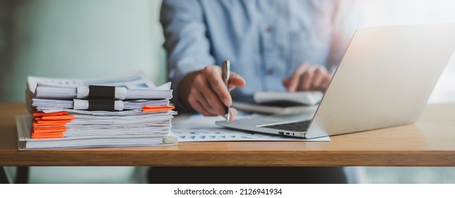 Business Documents, Auditor businesswoman checking searching document legal prepare paperwork or report for analysis TAX time,accountant Documents data contract partner deal in workplace office - Shutterstock ID 2126941934