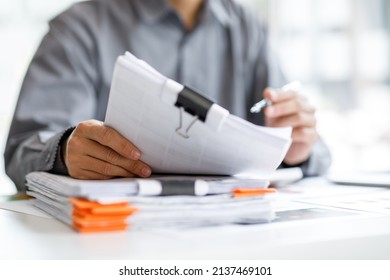 Business Documents, Auditor businesswoman checking searching document legal prepare paperwork or report for analysis TAX time,accountant Documents data contract partner deal in workplace office