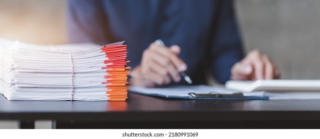 Business Documents, Auditor businesswoman checking searching document legal prepare paperwork or report for analysis TAX time,accountant Documents data contract partner deal in workplace office - Shutterstock ID 2180991069