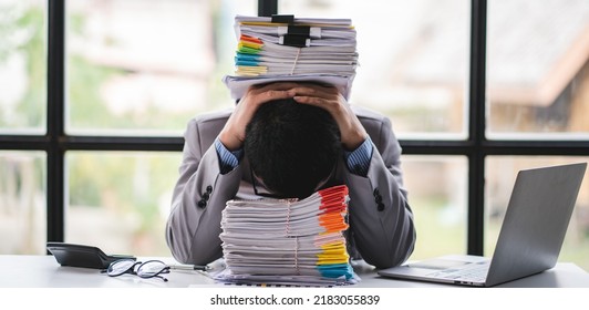 business documents businessman check legal document review Prepare documents or analysis reports, tax items, accounting documents, data contracts, office partner agreements. - Shutterstock ID 2183055839