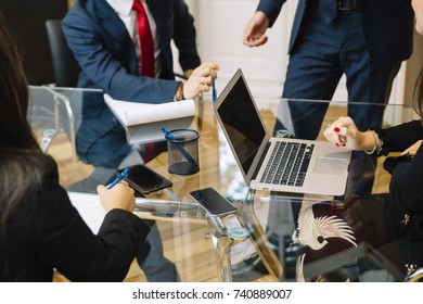 Business Documents On Office Table With Smart Phone And Laptop Computer 