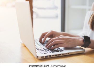 business documents on the table with a smart phone and graph with financial graph with social network diagram and man working in the background - Shutterstock ID 1240898392