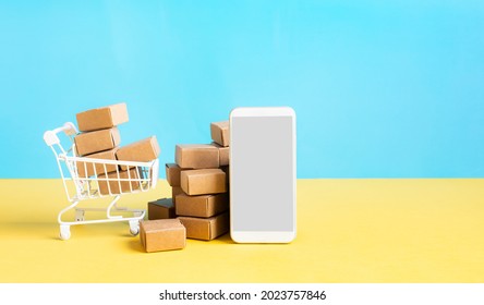 Business Ecommerce Or Online Shopping Concepts With Smartphone And Product Box Order.marketplace And Technology.copy Space