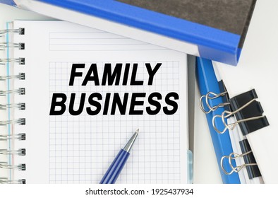 Business And Economics. Among The Documents, Folders, A Notebook With The Inscription - FAMILY BUSINESS