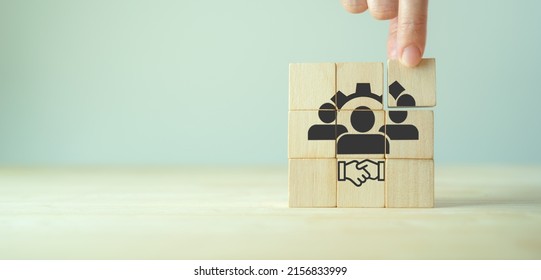 Business ecosystem and partnerships concept. Business collaboration strategies.  The value of network and solution of creating new opportunities.  Ecosystem partnerships symbol on wooden cubes. - Shutterstock ID 2156833999