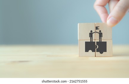 Business ecosystem and partnerships concept. Business collaboration strategies. The value of network and solution of creating new opportunities. Ecosystem partnerships symbol on wooden cubes. - Shutterstock ID 2162751555