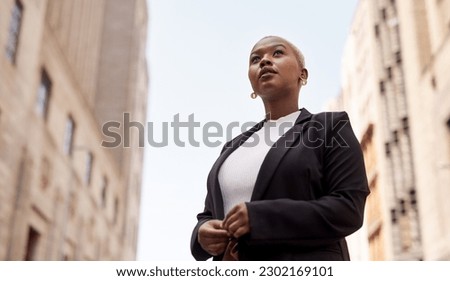 Business, employee and black woman in the city, career and confident lady travelling in town. Female person, entrepreneur and consultant in the outside, formal and professional with startup success
