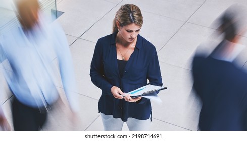 Business Employee Reading Paperwork, Crowd Of People Walking Fast And Serious Corporate White Woman Stopping In Lobby Hall. Busy Office Building, Hold Company Documents And People Traffic Blur Motion