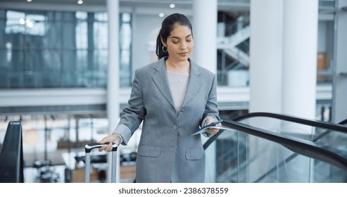 Business, escalator and travel with woman, smartphone and social media with accountant, suitcase and ticket. Person, employee and broker with a cellphone, airport or convention with connection or app - Powered by Shutterstock