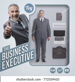 Business Executive Lifelike Doll With See Through Toy Packaging, Accessories And Smiling Businessman Giving A Thumbs Up