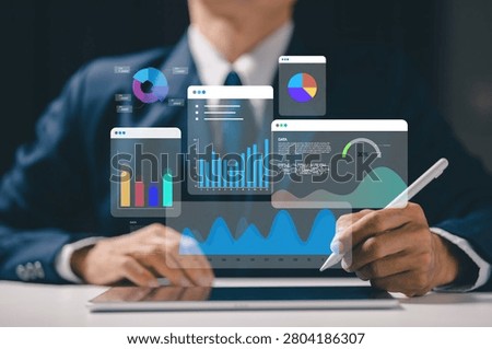 Business executive using tablet with interactive analytics dashboard displaying charts, graphs, business intelligence, performance metrics, data visualization, and strategic decision making.