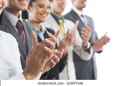 Business executives applauding - Powered by Shutterstock