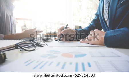 business executives discussing in a meeting