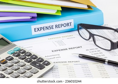 Business Expense Report Binder With Financial Documents And Calculator