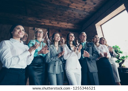Business family concept. Photo of ecstatic elegant in classic suit jacket blazer confident crowd clapping hands stand look at speaker boss chief ceo chairman in loft interior room