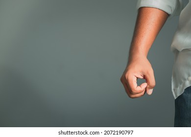 Business fight concept close-up portrait of a young man's fist on a black background
 - Shutterstock ID 2072190797