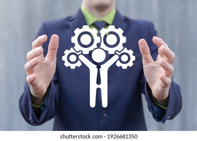 Business And Finance Concept Of Facilitation. Facilitator Is Holding Virtual Icon Man With Gears Mechanism.