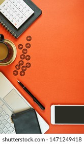 Business And Finance Desk Workspace Concept With Stylish Masculine Accessories And High Tech Laptop On Stylish Brown Background.