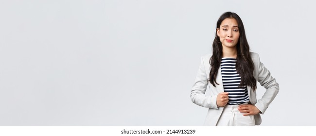 Business, Finance And Employment, Female Successful Entrepreneurs Concept. Arrogant And Confident Young Asian Businesswoman Looking Unimpressed, Make Skeptical Smirk