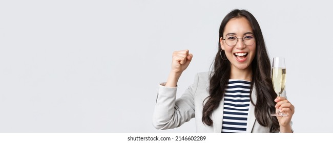 Business, Finance And Employment, Female Successful Entrepreneurs Concept. Happy Asian Businesswoman Celebrating, Having Office Party, Drinking Champagne, Chanting From Rejoice, Triumphing