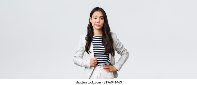 Business, Finance And Employment, Female Successful Entrepreneurs Concept. Arrogant And Confident Young Asian Businesswoman Looking Unimpressed, Make Skeptical Smirk