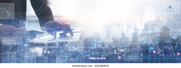 Business Finance And Investment Concept. Double Exposure Of Businessman Working On Laptop Computer And The City, Financial Graph, Economic Growth Chart For Business And Financial Technology Background