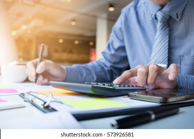 Business Finance Man Calculating Budget Numbers, Invoices And Financial Adviser Working.