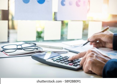 Business Finance Man Calculating Budget Numbers, Invoices And Financial Adviser Working.