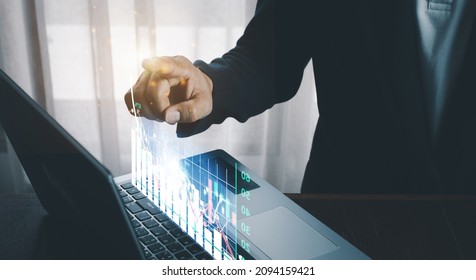 Business finance technology and investment concept. Stock Market Investments Funds and Digital Assets. businessman analysing forex trading graph financial data. Business finance background. - Shutterstock ID 2094159421