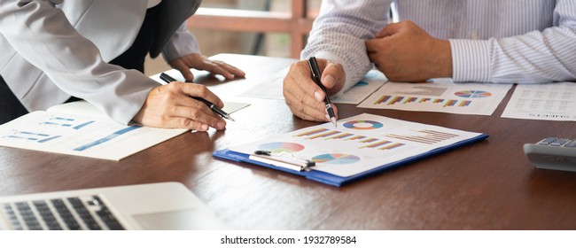 Business and Financial concept. Business team discussing assessment and evaluation of corporate showing the results of their successful teamwork. - Shutterstock ID 1932789584