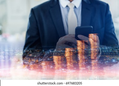 business financial ideas concept with money coin stack and city building background