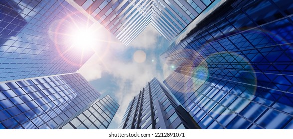 concepto de edificios de rascacielos empresariales y financieros.Vista de bajo ángulo y lente de rascacielos de edificios modernos de oficinas de ciudad en centro de negocios con cielo azul.