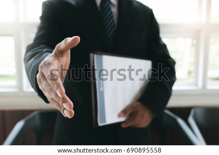 Business find new job, interview the job and hiring. Job applicant holding resume.Open handshake and resume job interview or acceptance.
